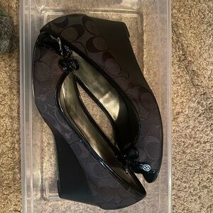 Open toe black Coach wedges